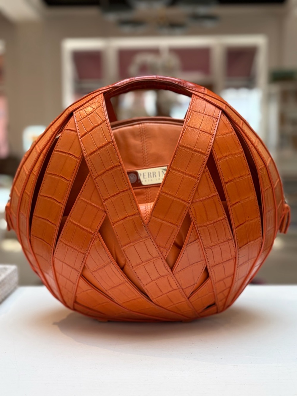 Perrin Paris Orange Woven Round Mini Bag